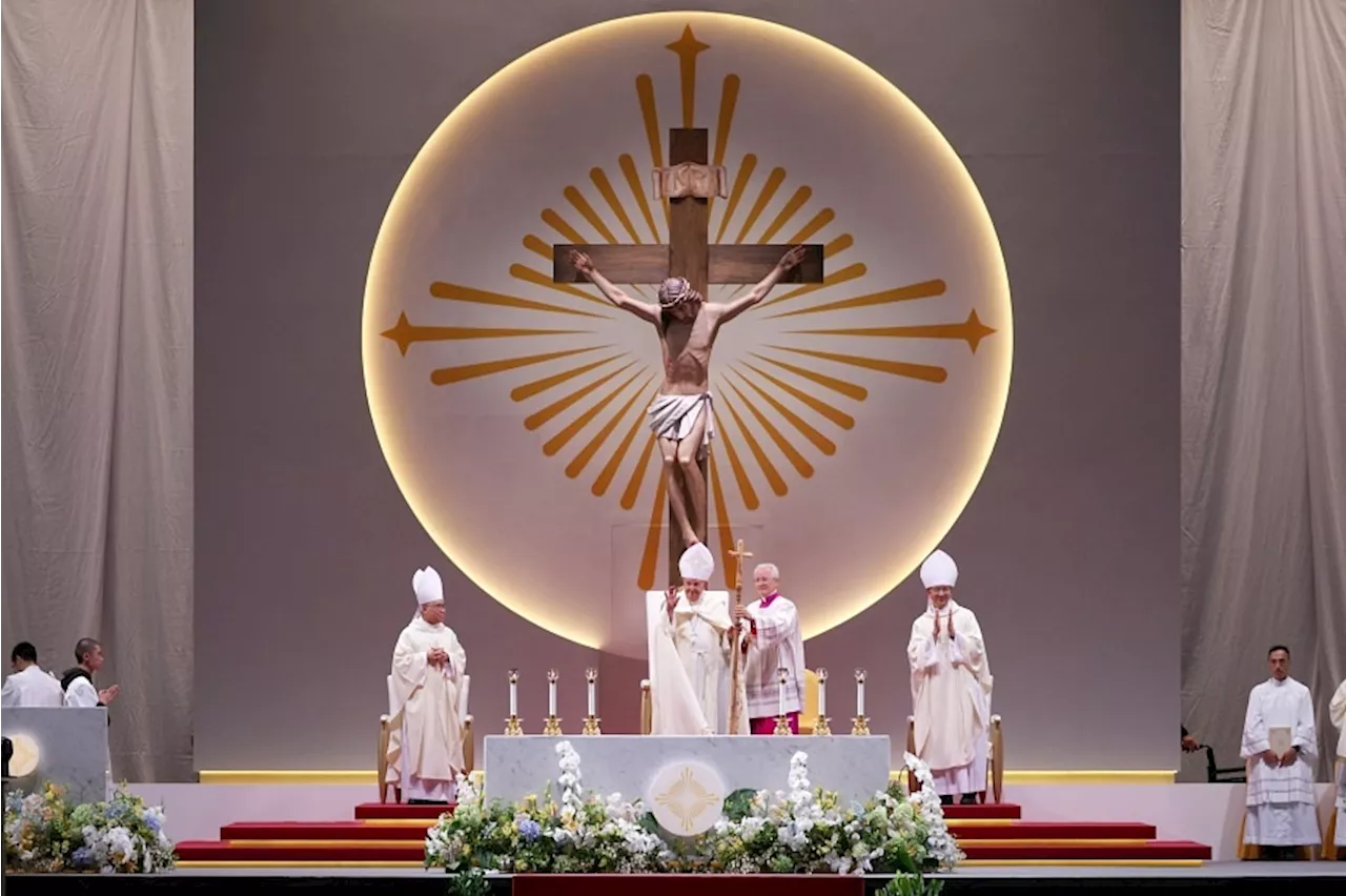 ‘Once in a lifetime’: More than 50,000 gather at National Stadium for Pope Francis’ mass