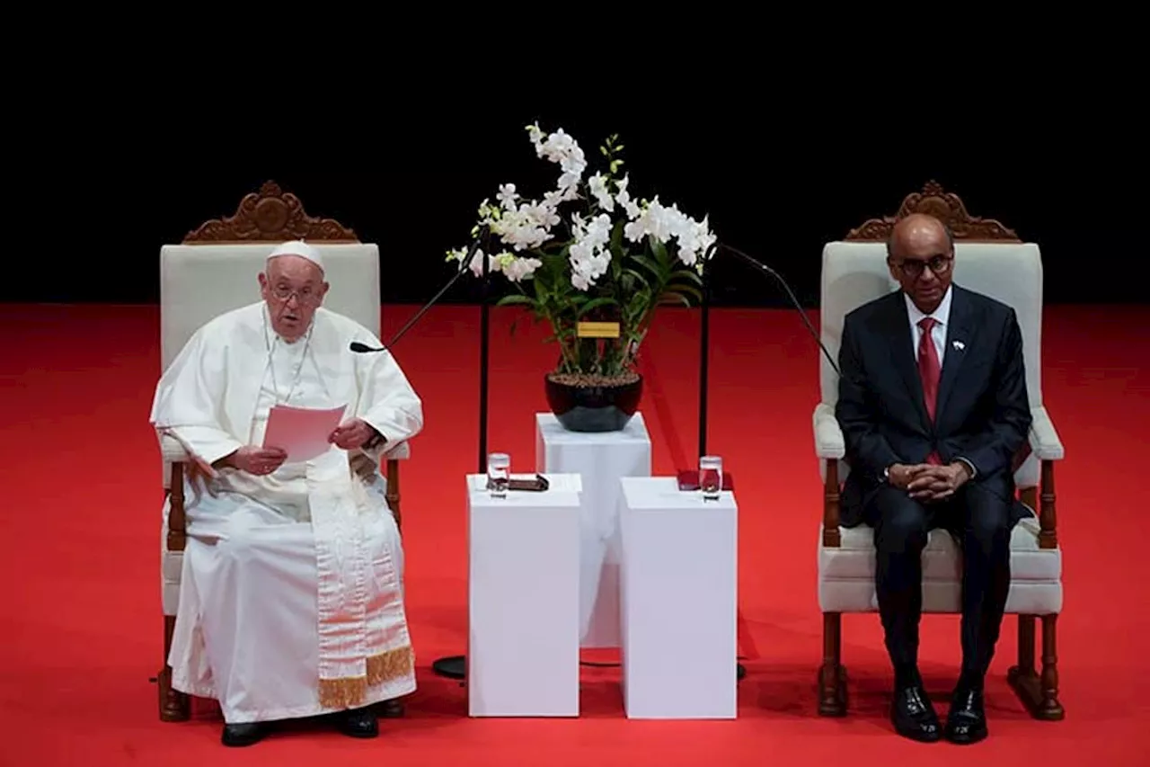 Pope marvels at Singapore's skyscrapers and asks that the lowest migrant workers not be forgotten