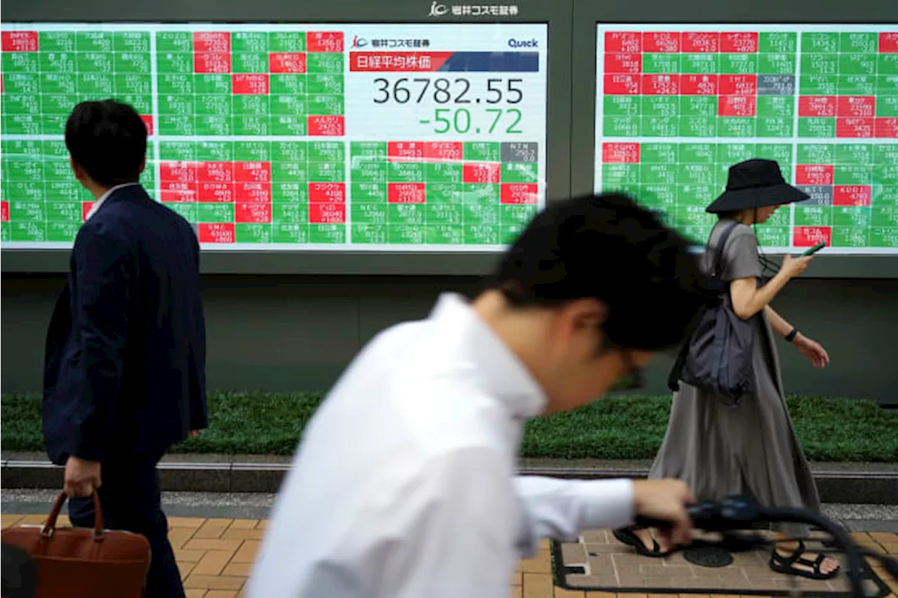 Asian markets trade mixed after Wall Street climbs closer to its record high