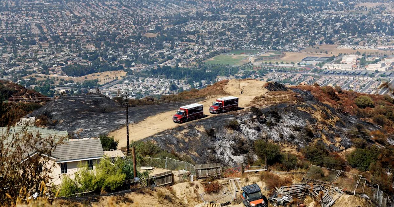 Firefighters gaining control over destructive Southern California wildfires