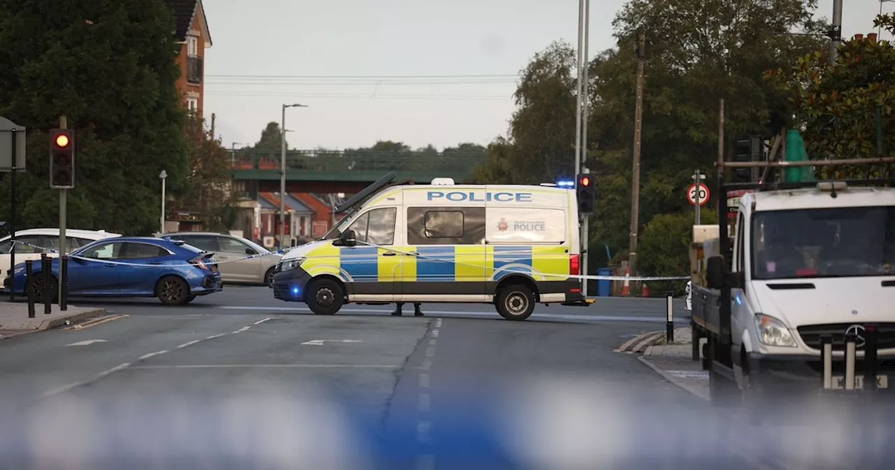 LIVE: Police tape off 'several' Manchester roads after armed police tackle knifeman