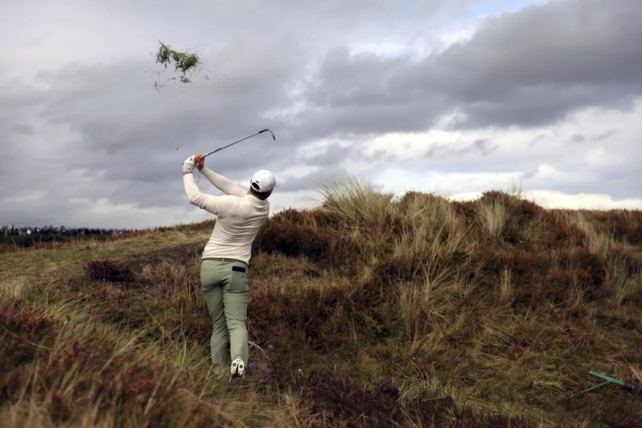 Rory McIlroy survives a strong wind for a 69 to lead Irish Open over Manassero