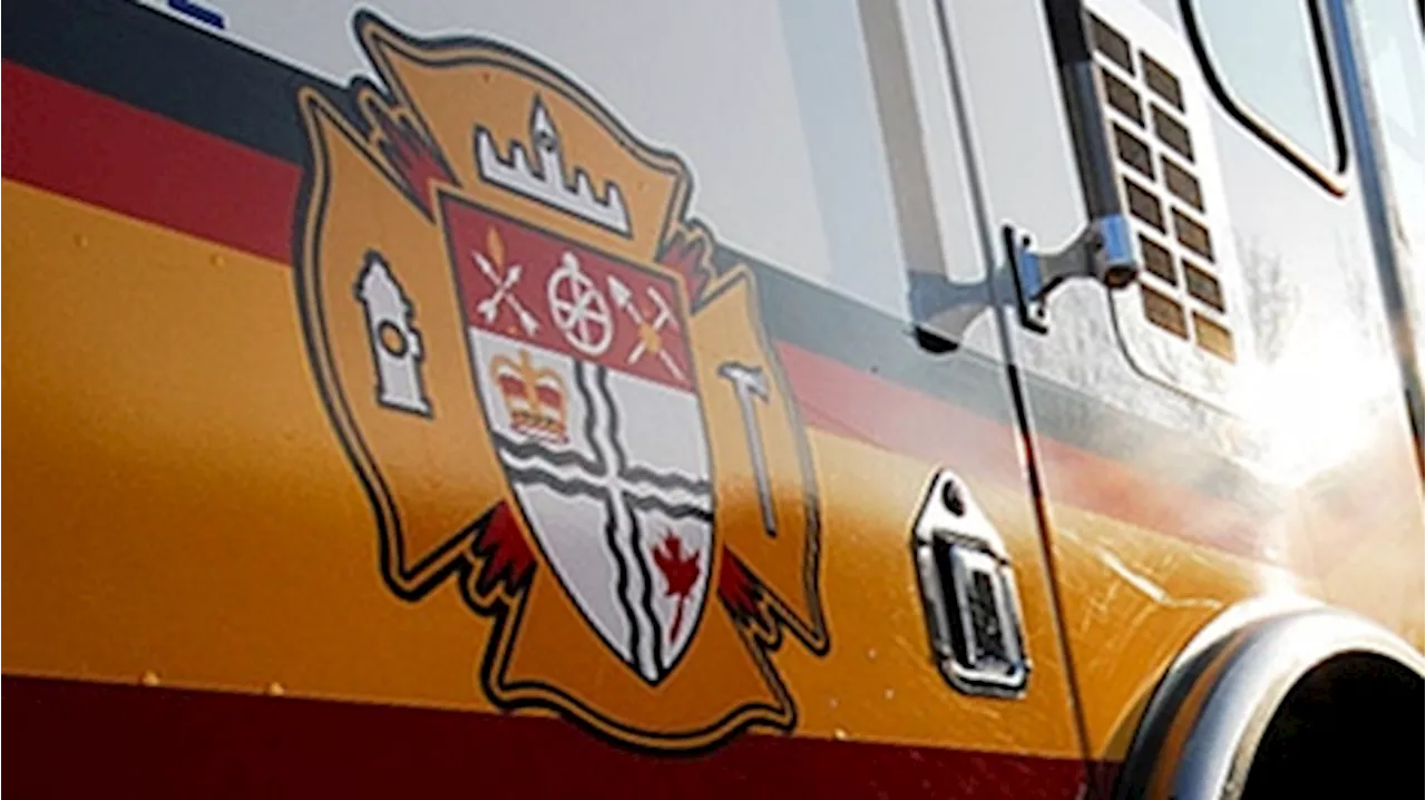 kitchen fire in low-rise residential building displaces resident in Carlington