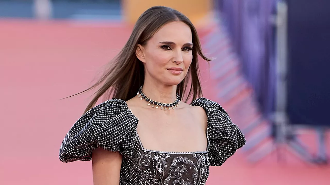 Natalie Portman, 43, wows in a glittering gown at the Deauville American Film Festival in France as...