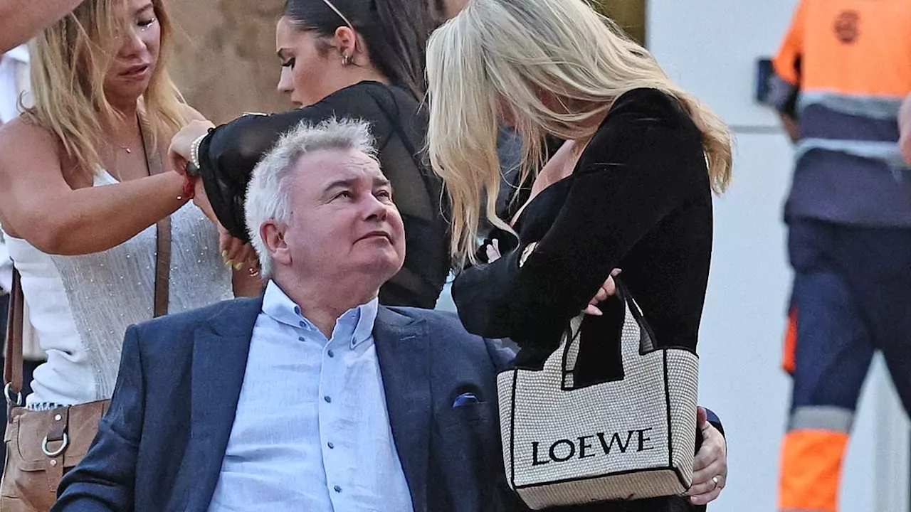 Eamonn Holmes, 64, cheekily grabs Katie Alexander's, 42, BOTTOM