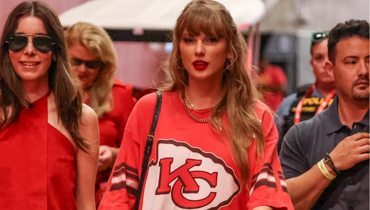 Taylor Swift Styles an Oversize Chiefs T-Shirt Like a Mini Dress With Classic Black Boots