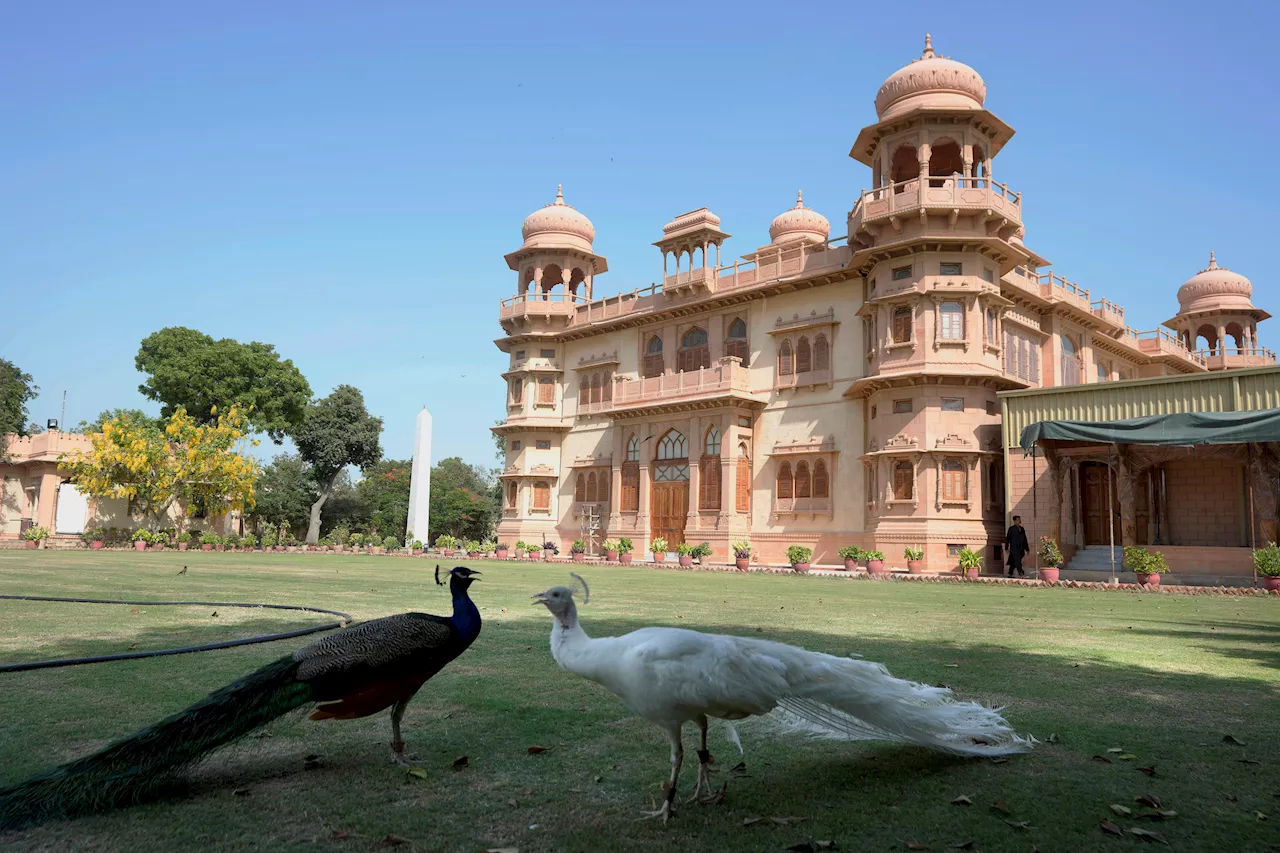 A Pakistani megacity's past is vanishing, but a flamboyant pink palace endures