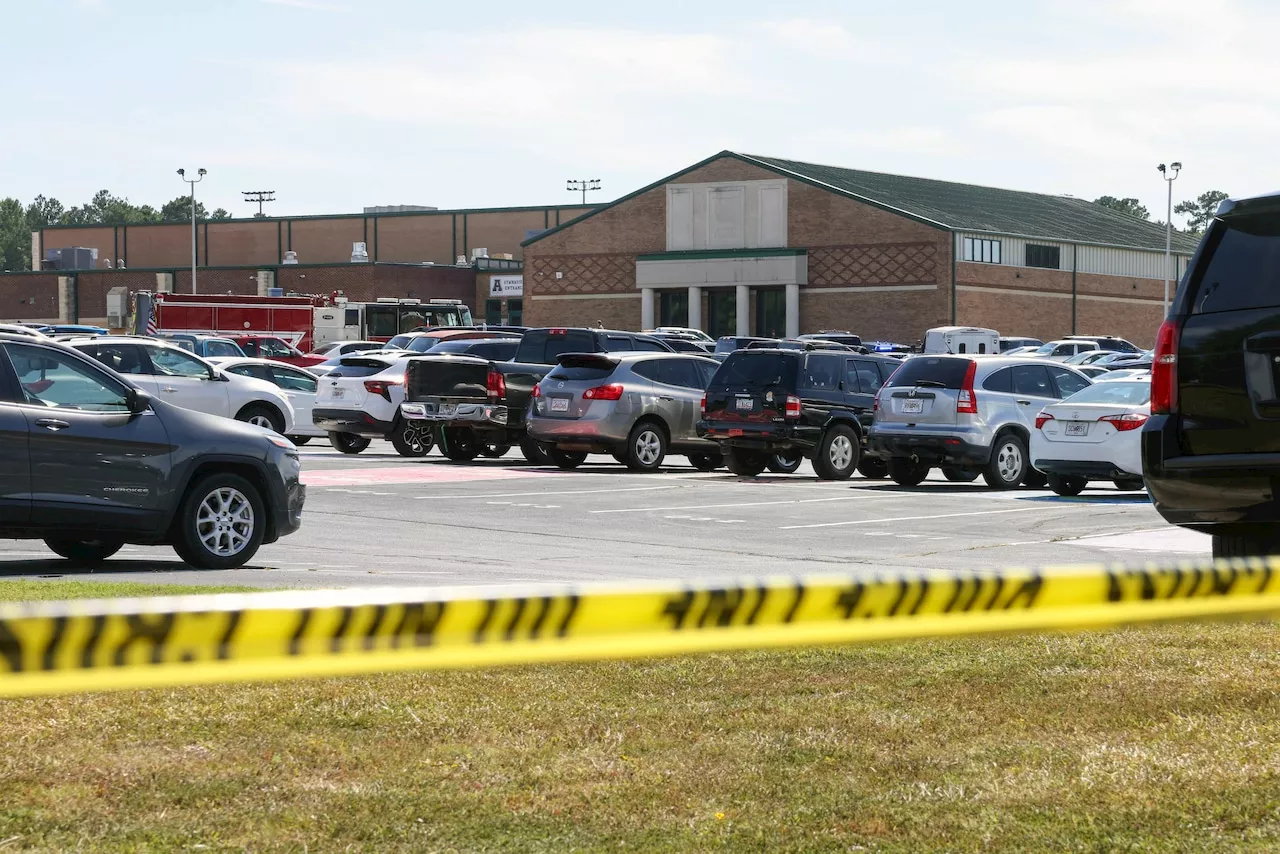 Fearing the worst, schools deploy armed police to thwart gun violence