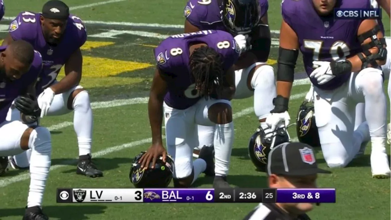 Lamar Jackson and Ravens ‘take knee in prayer’ as chain gang member receives CPR on sidelines before lea...