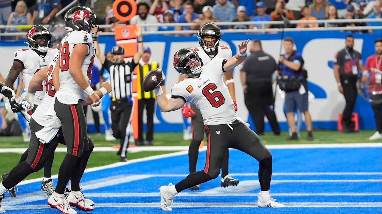 Mayfield runs for TD, throws TD pass to send Bucs past Lions in playoff rematch