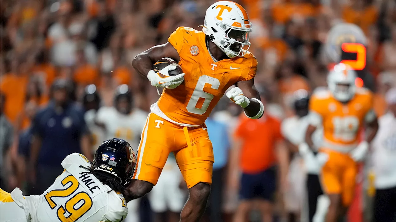 Sampson rushes for 4 TDs as No. 7 Tennessee routs Kent State