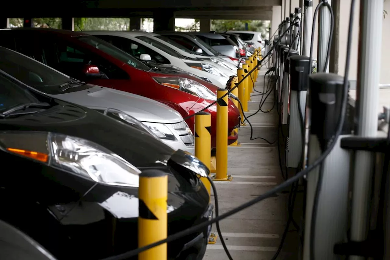 EV sales are still growing. So why are carmakers pulling back?