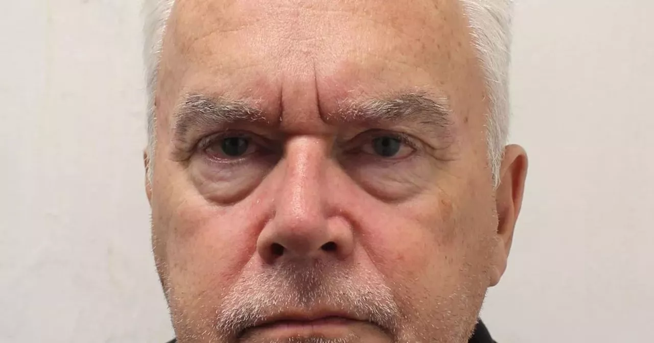 Huw Edwards' bleary-eyed mugshot emerges as he dodges jail