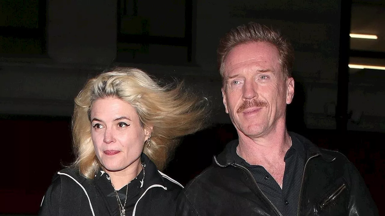 Damian Lewis cuts a trendy figure in a black leather jacket as he joins girlfriend Alison Mosshart...