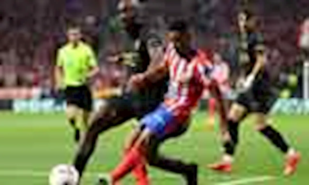 Atletico cruise to 3-0 win over struggling Valencia