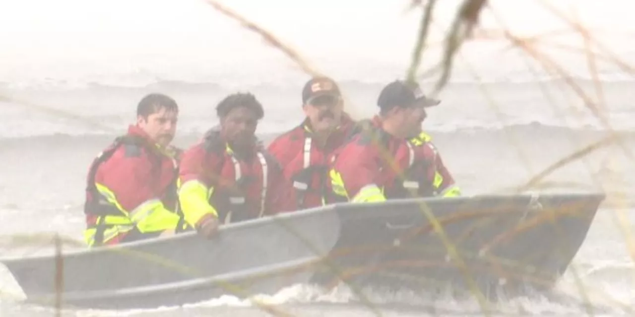 Local rescue agencies save two boaters stranded on a kayak in Mobile Bay