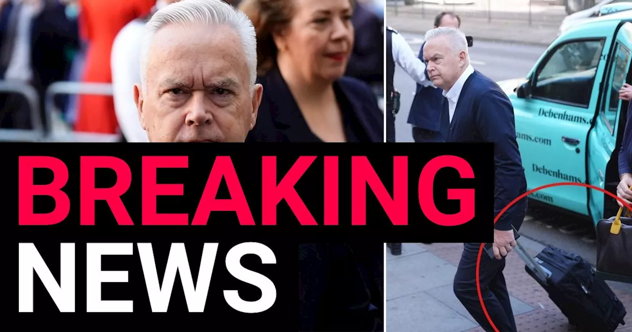 Huw Edwards pulls suitcase as he arrives at court to be sentenced