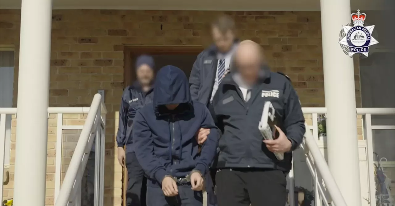 Major raids as AFP busts crime group, arrests alleged mastermind of secret 'Ghost' network