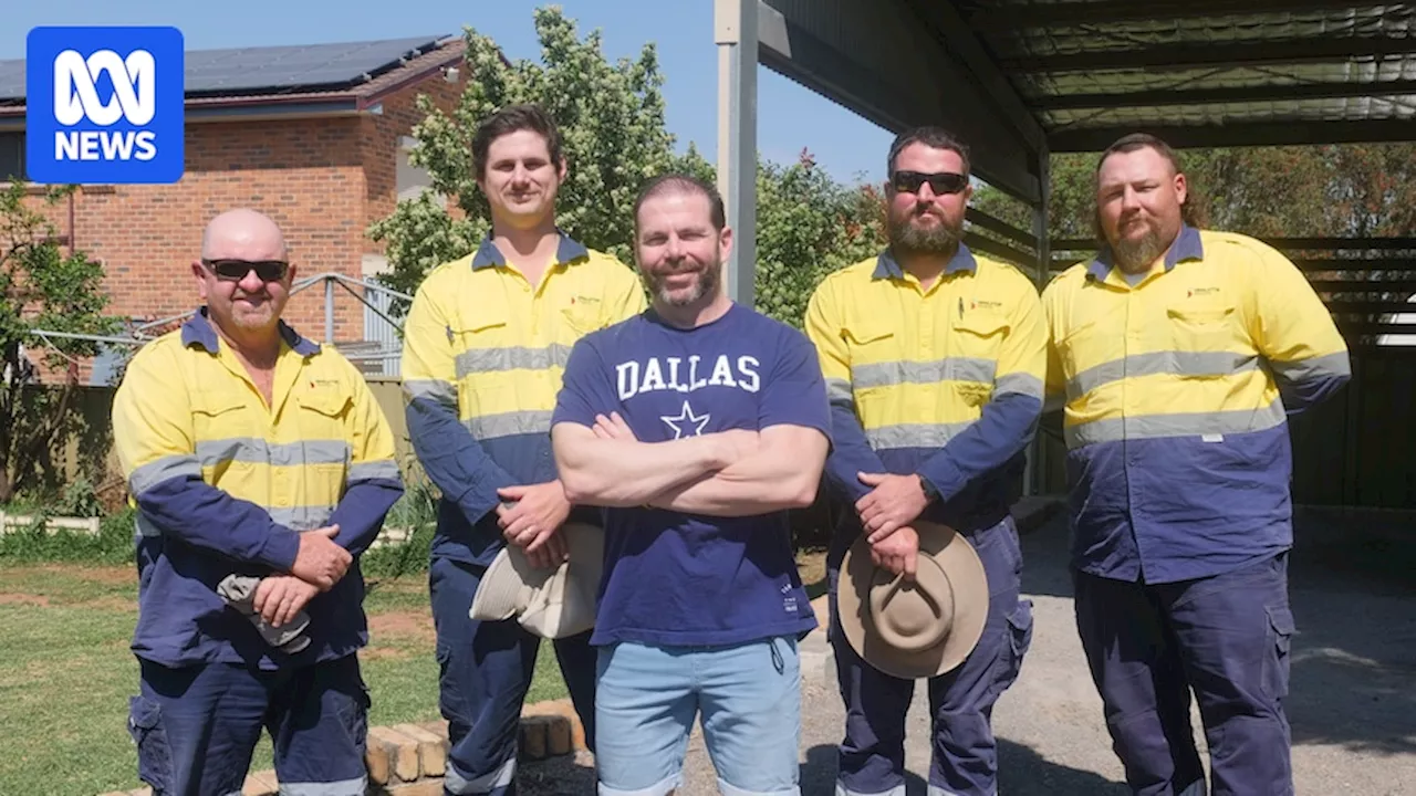 Survivor of bite from eastern brown snake reunites with the tradies who saved him