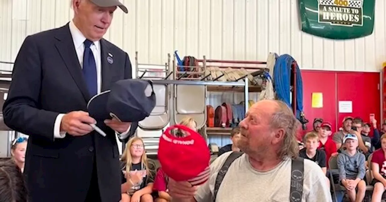 Biden Briefly Put on a Trump Hat, and MAGA World Flipped Its Lid