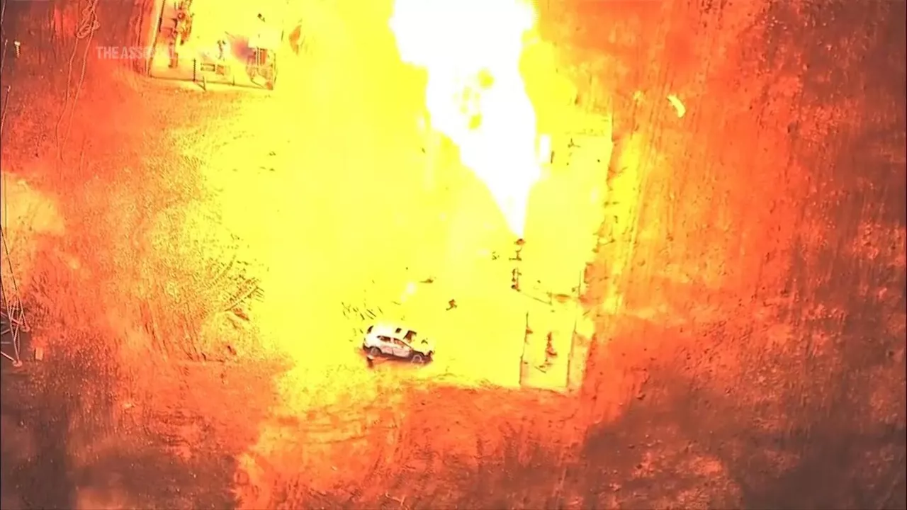 Massive pipeline fire burning near Houston began after a vehicle struck a valve, officials say