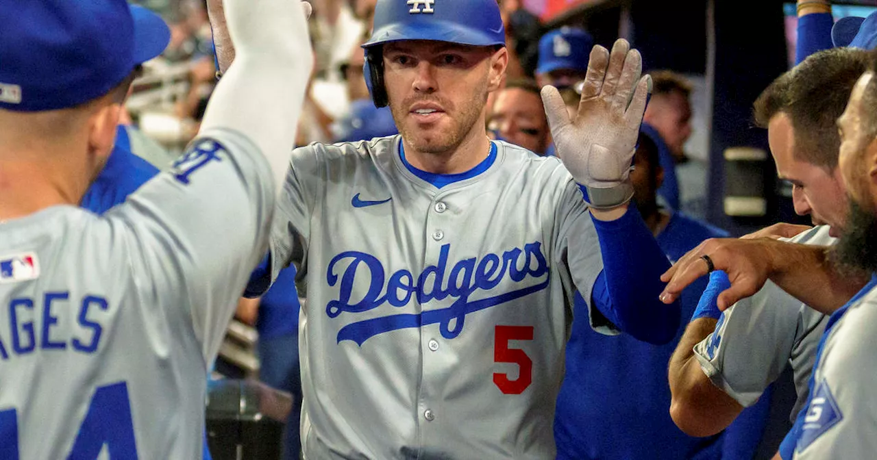 Freeman's 3-run homer helps Dodgers to 9-0 win over Braves