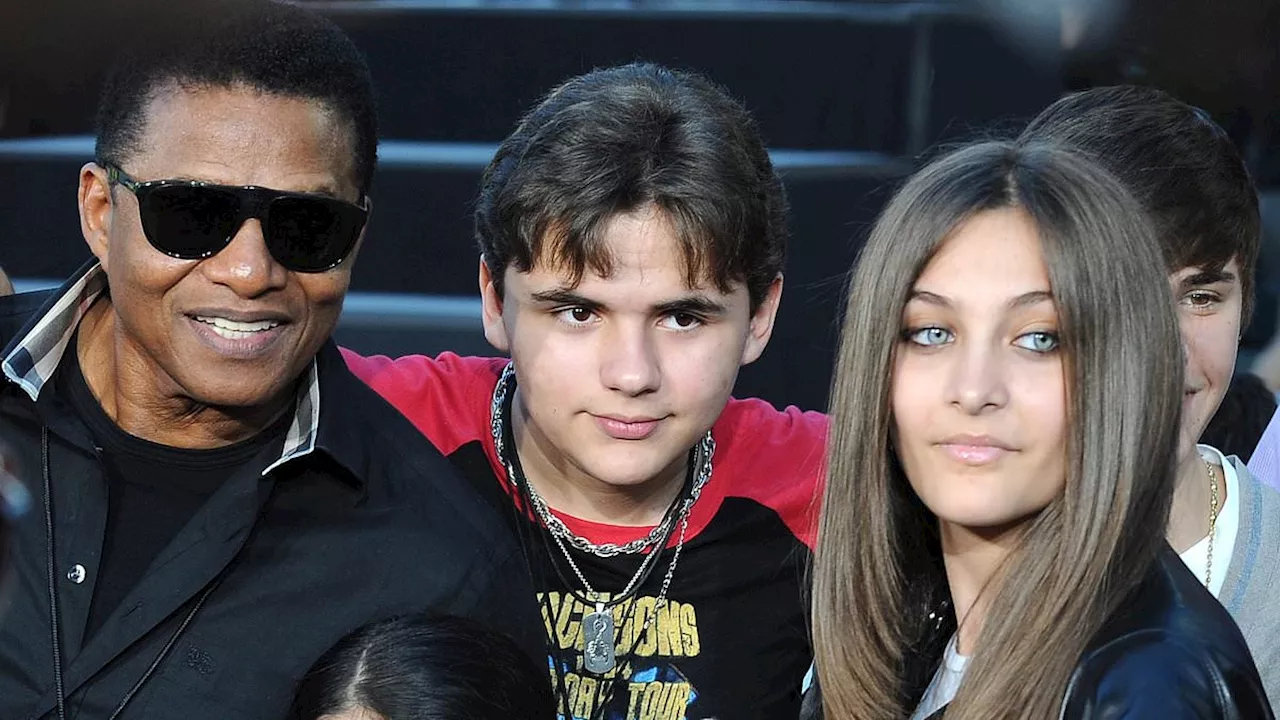 Michael Jackson's children Prince and Paris pay tribute to uncle Tito Jackson following his death...