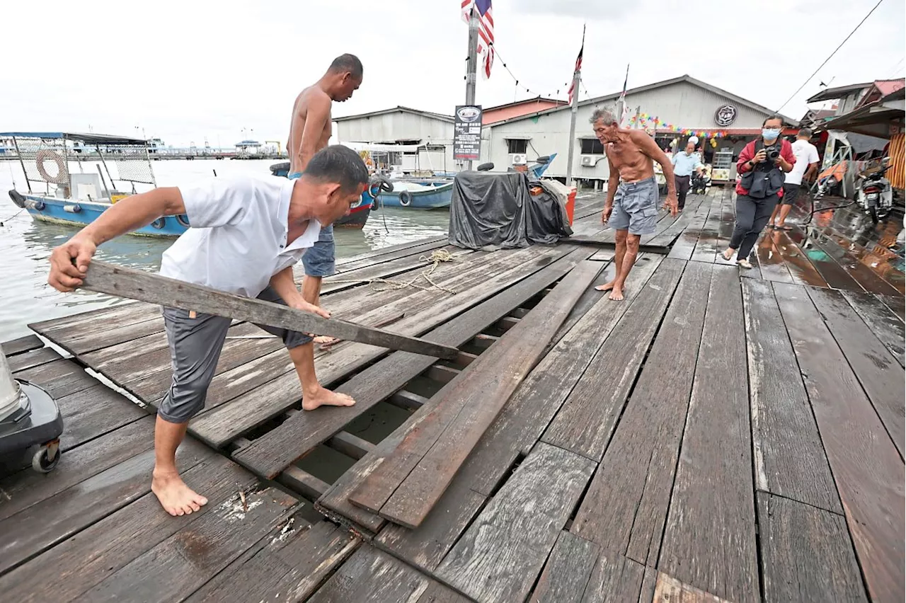 Mayhem as storms lash Penang