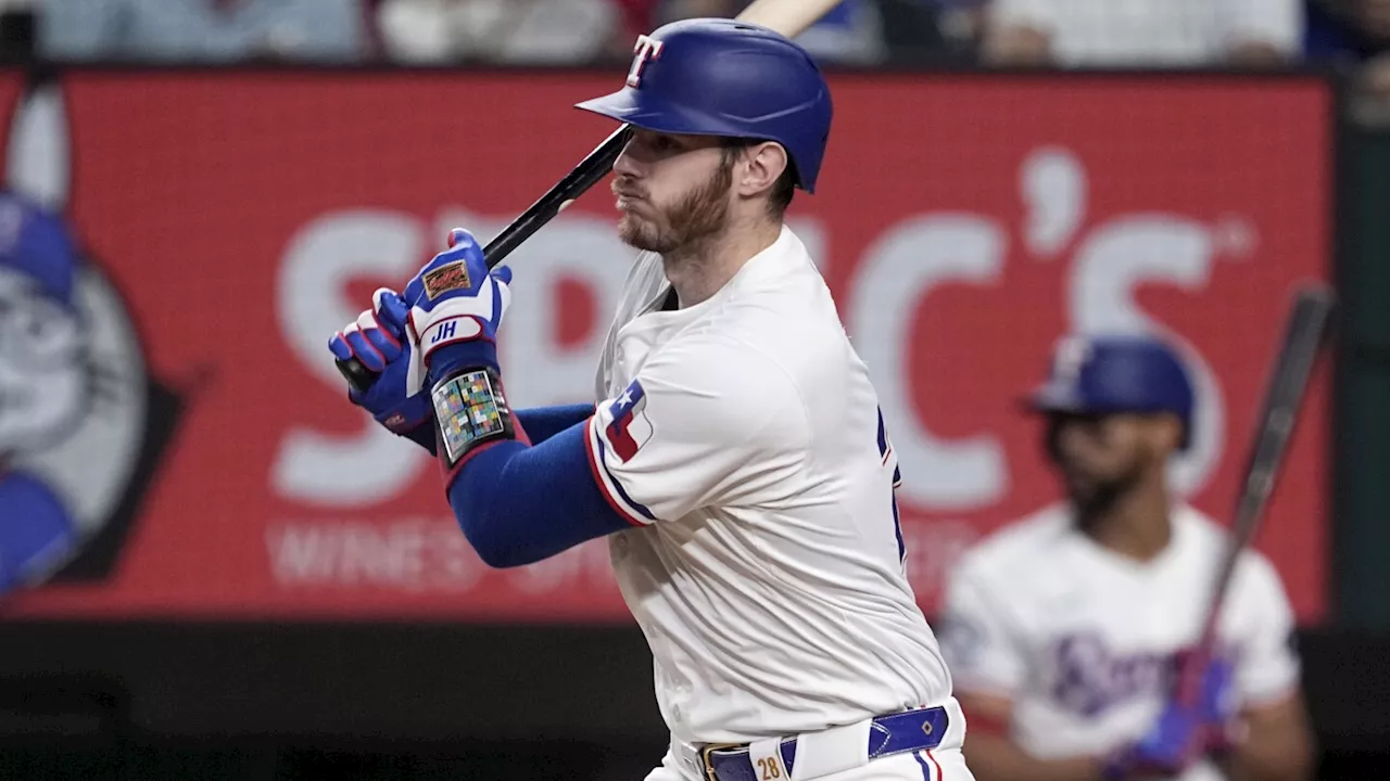 Langford and Taveras homer, struggling Heim has key hit as Rangers beat Blue Jays 13-8