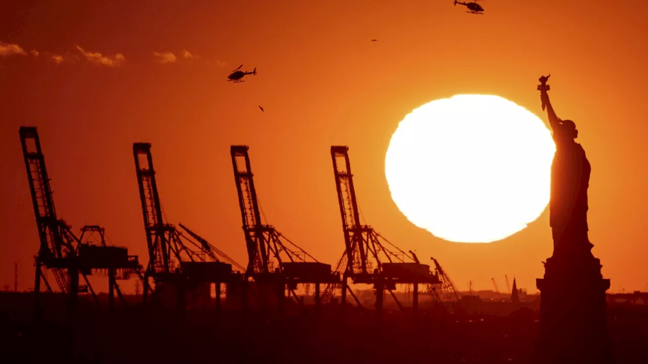 Longshoremen at key US ports threatening to strike over automation and pay