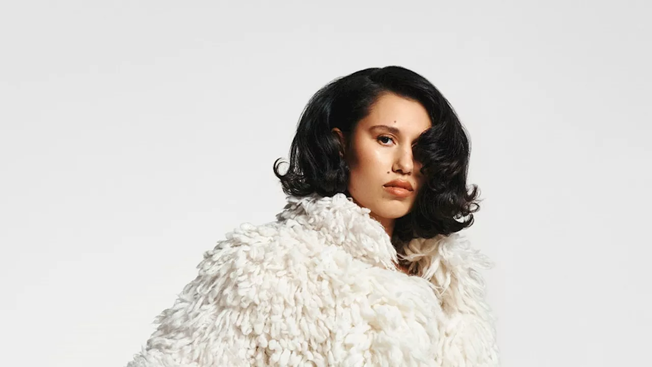 Raye Shares Her First Major Fashion Campaign With A Polar Bear