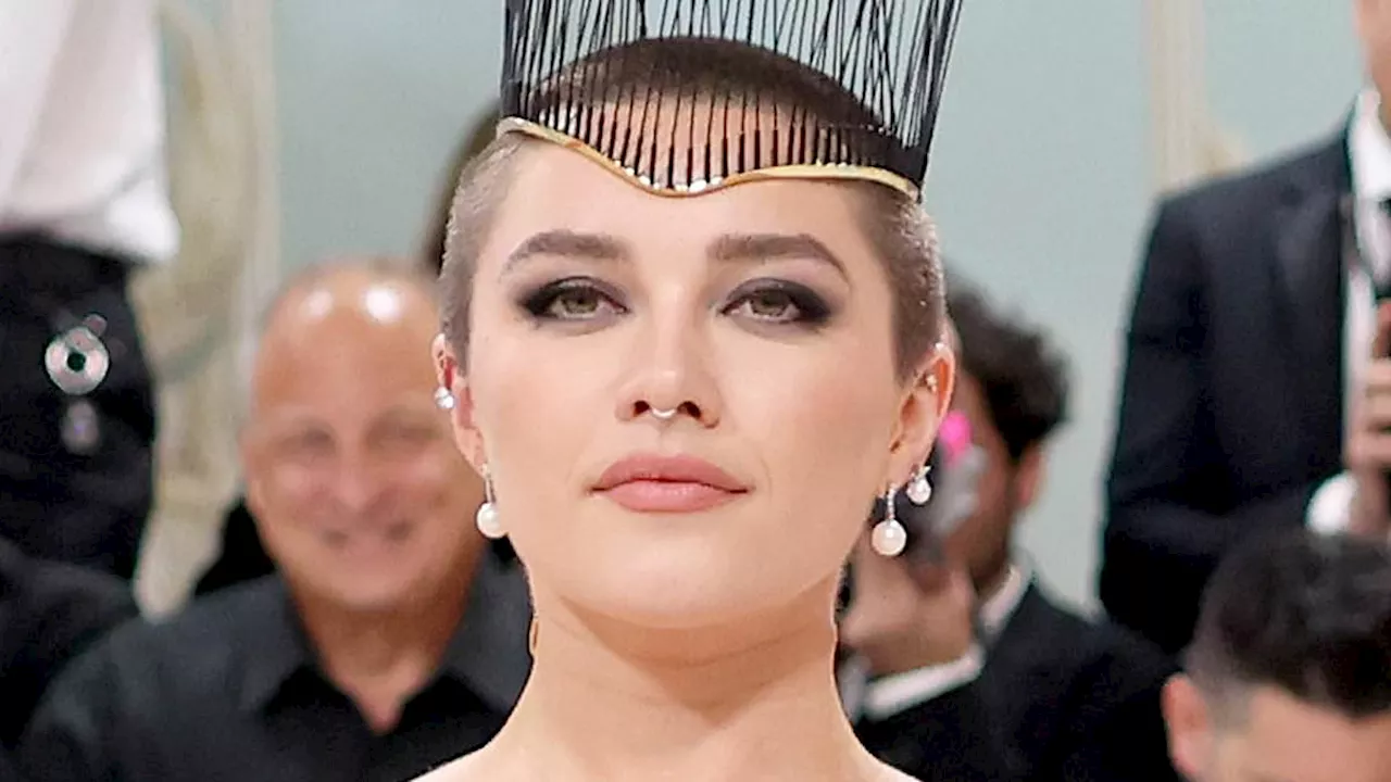 Florence Pugh reveals her 'body went into trauma' after she shaved her head and says she is...