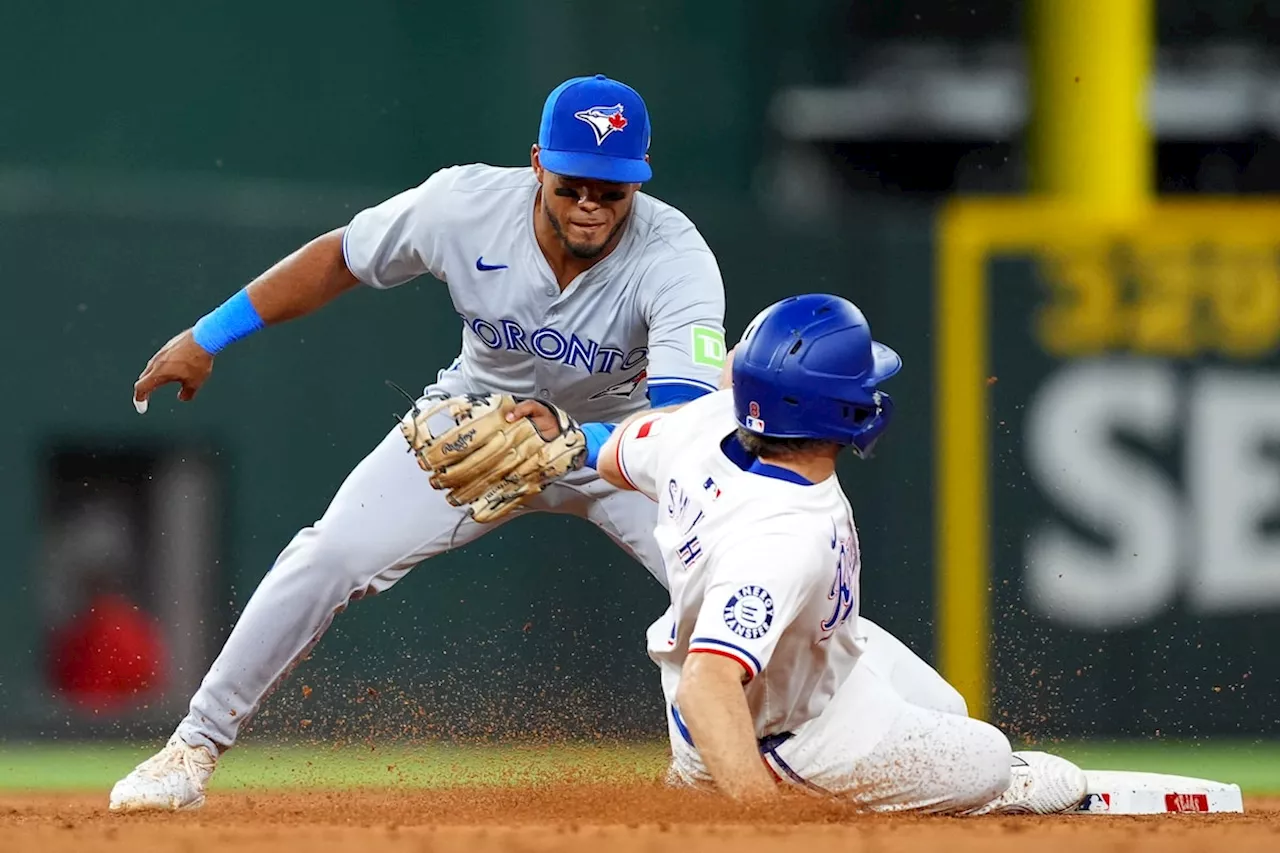 Struggling Heim has key hit as Rangers rout Blue Jays 13-8