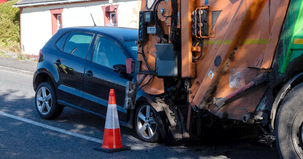 Bin lorry workers have lucky escape after car ploughs into back of truck