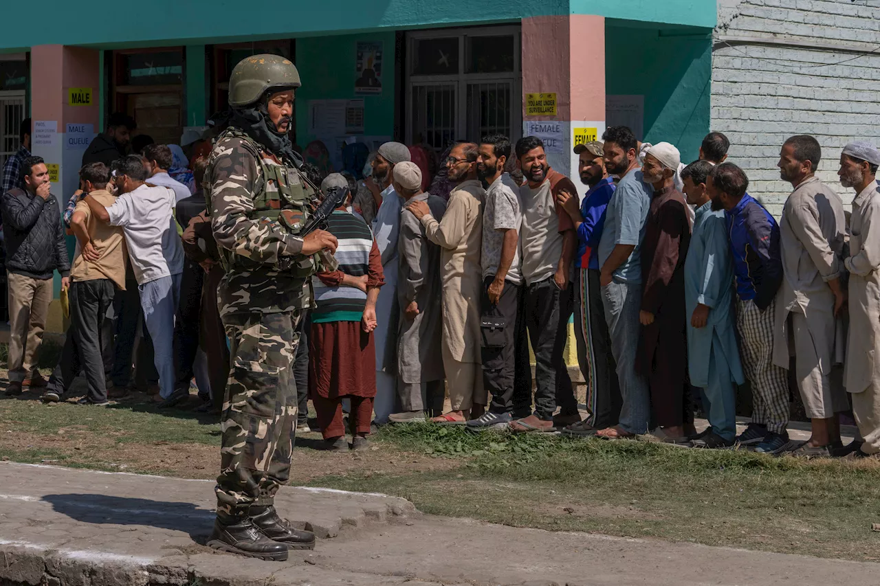 Voting for local government opens in Indian-controlled Kashmir for first time after losing autonomy