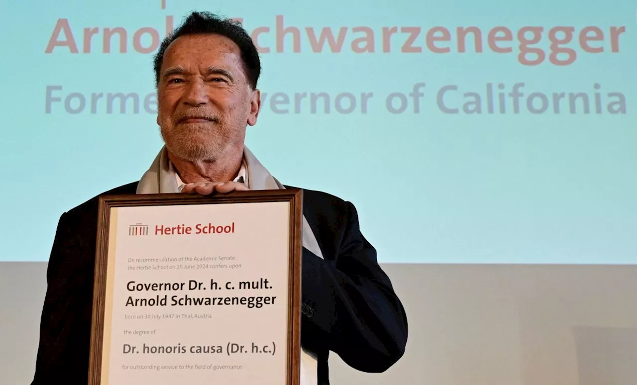 Dr Schwarzenegger: Action star honoured with doctorate in Berlin