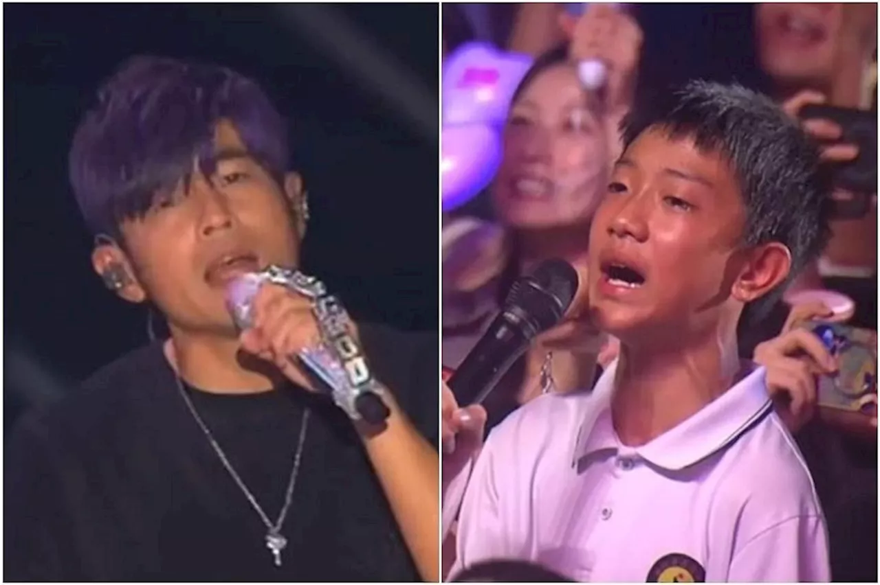 Young fan cries at Jay Chou concert after singing a song with the star