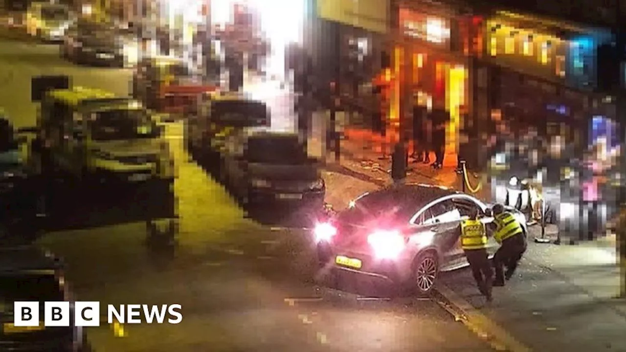 Bournemouth: CCTV shows driver reversing into officers, police say