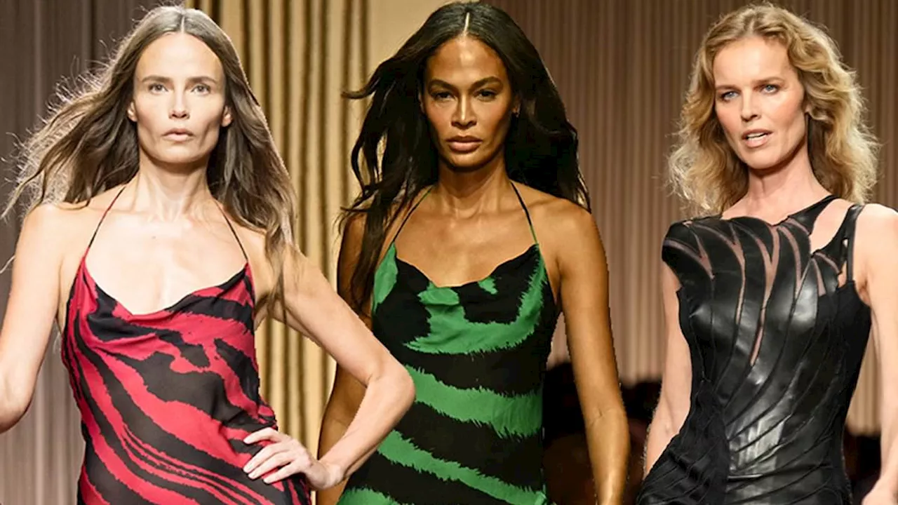 Eva Herzigova wows in a leather gown as she walks alongside Natasha Poly and Joan Smalls while Naomi...