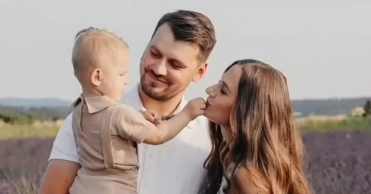 Heartbreaking moment tot hugs photos of dad and pregnant mum after drowning