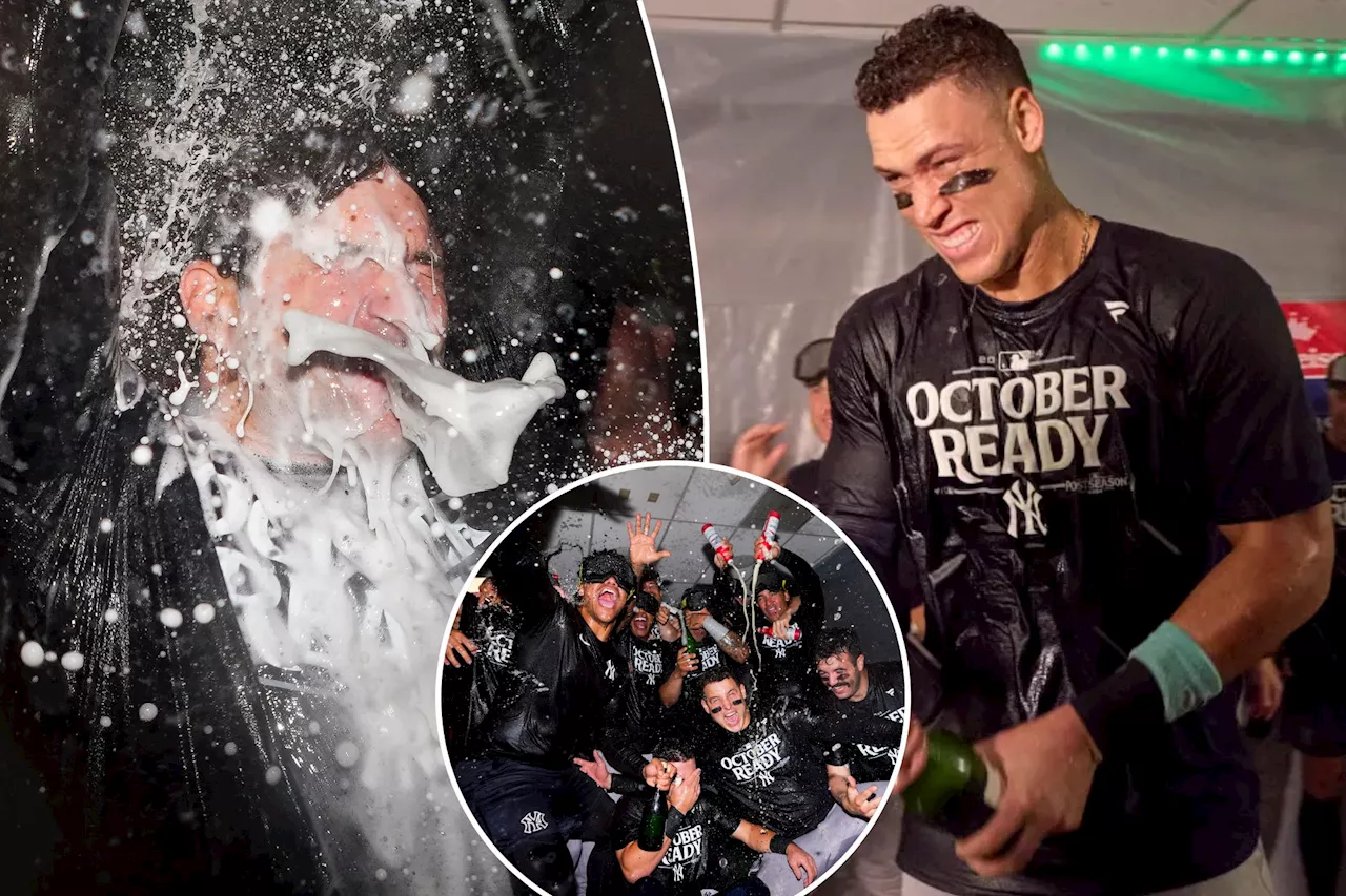 See the Yankees' champagne-filled clubhouse celebration after clinching MLB playoff berth