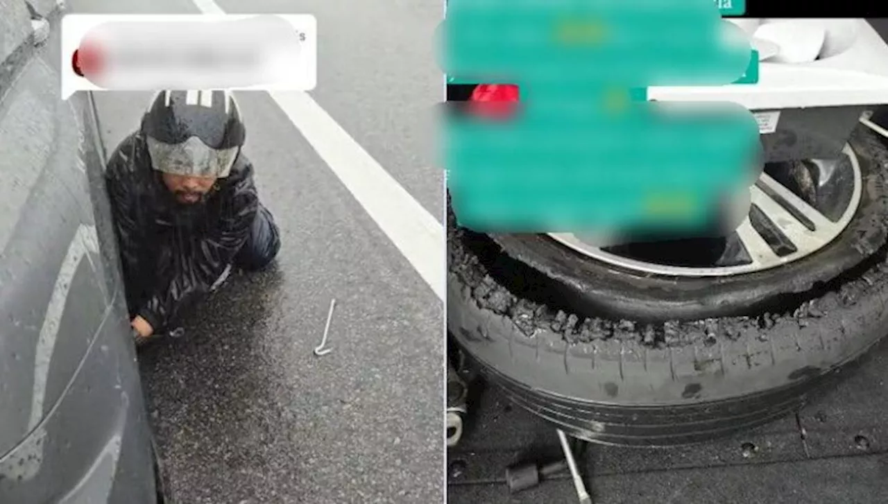 Kind Motorcyclist Changes Tyre For Stranded Woman In Heavy Rain