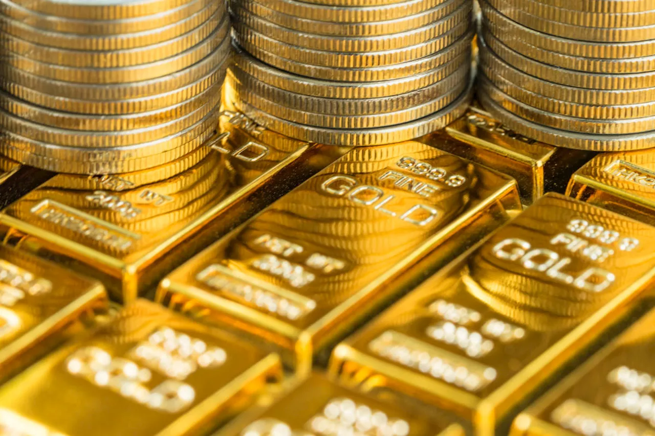 Gold hovers near record highs. Here's where analysts say it's headed next.