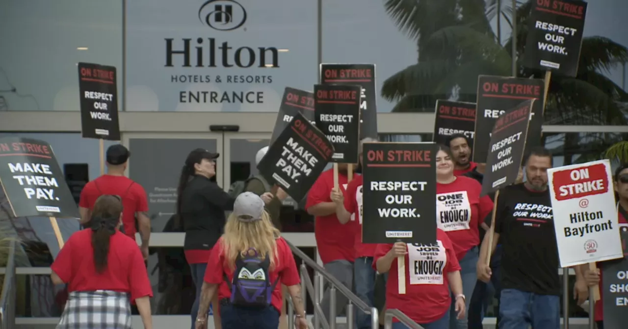 Hotel workers strike outside Hilton Bayfront on Labor Day