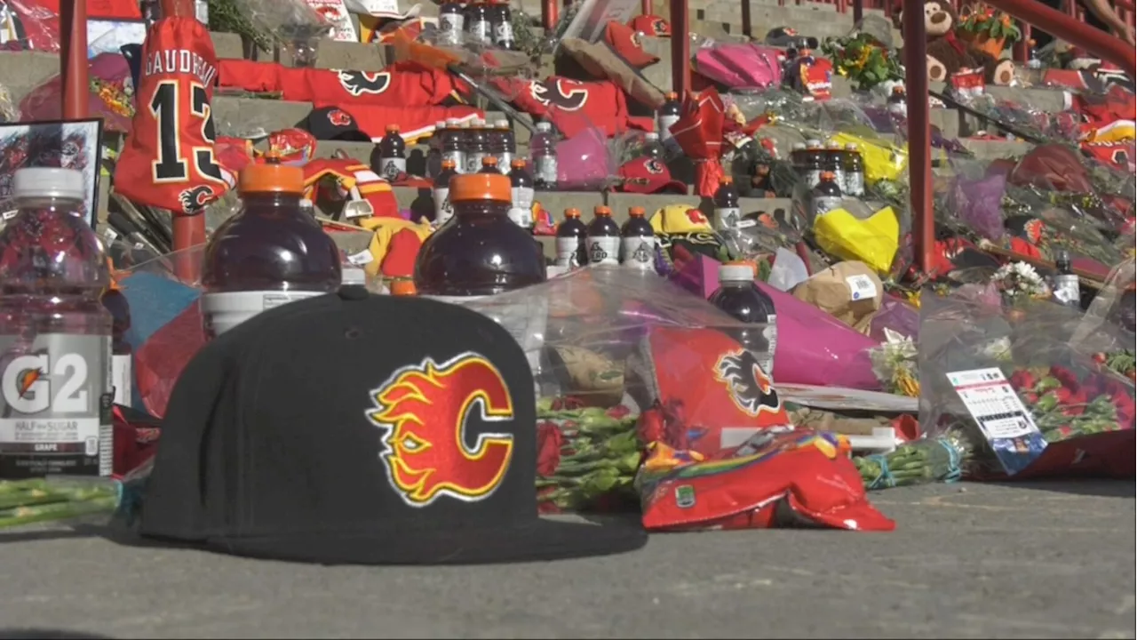 Purple Gatorade and Skittles: Calgary fans leave mementos in tribute to Johnny Gaudreau