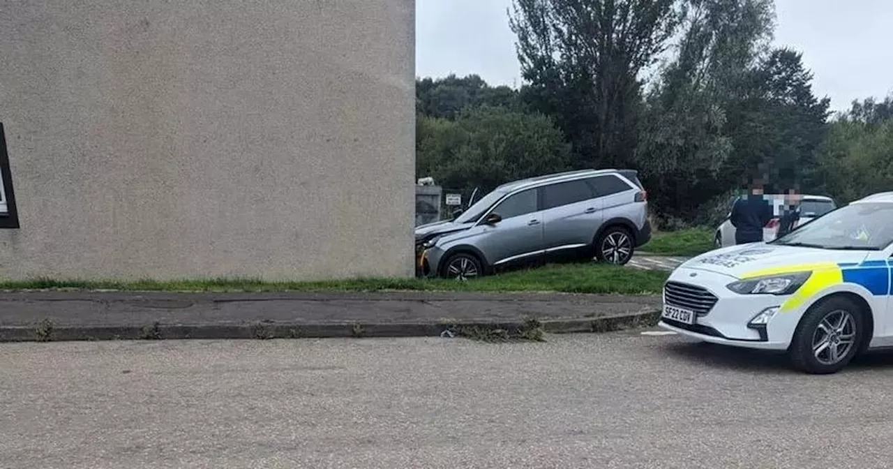 Car ploughs into block of flats in Scots housing estate after police chase