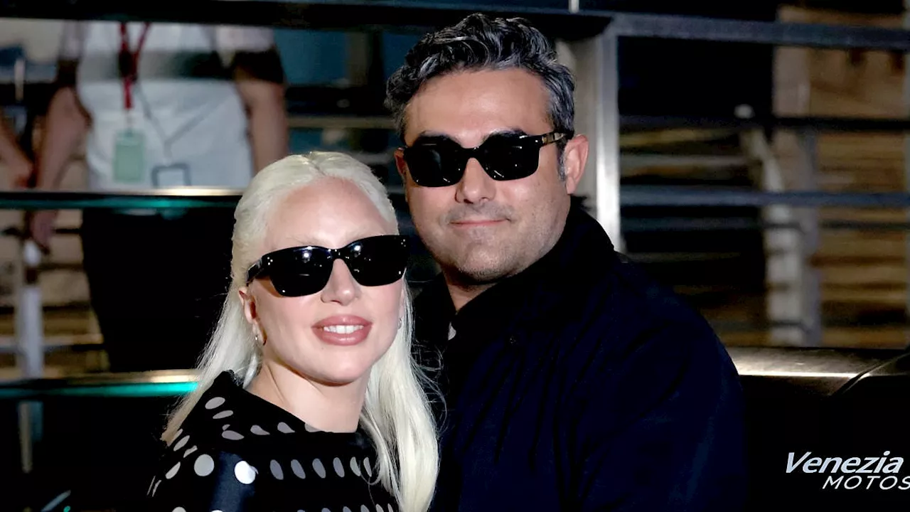 Lady Gaga plants a kiss on fiancé Michael Polansky at Venice