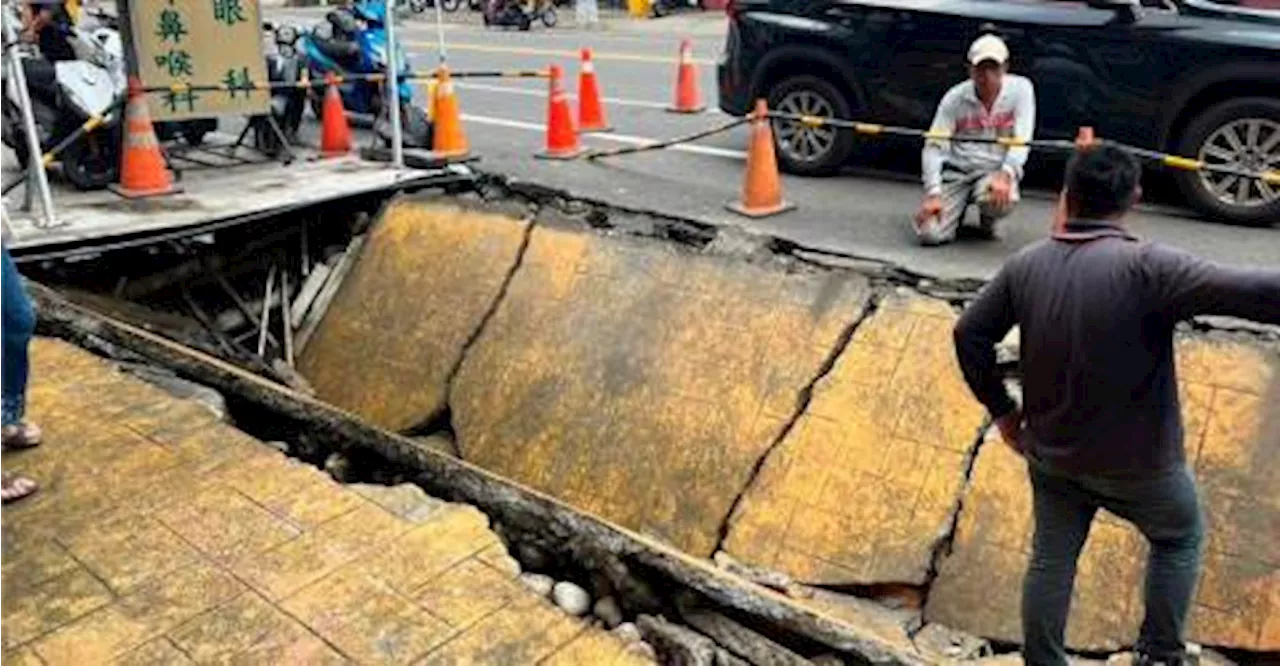 1.4m-deep sinkhole opens up in Taiwan, motorcycles damaged