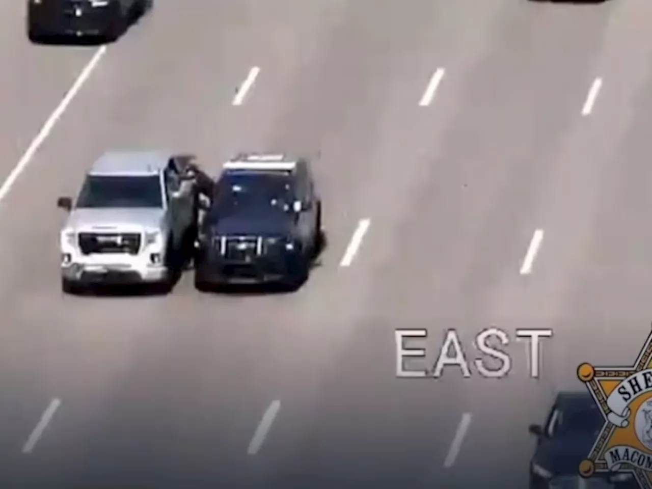 Michigan Officer Hailed As Hero For Daring Save On The Road, Climbing Into Truck While Driving [Video]