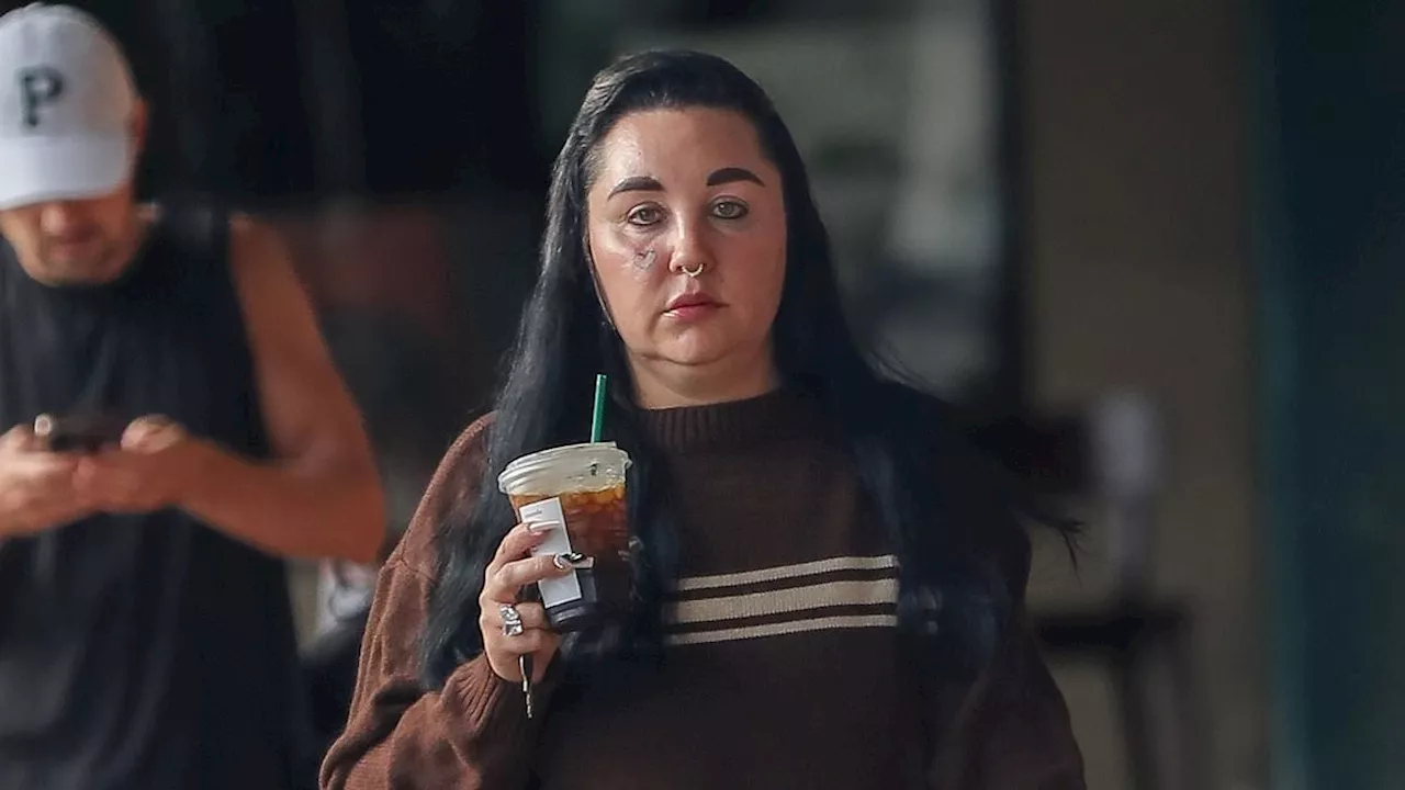 Amanda Bynes steps out for an iced coffee.... after giving fans a look inside her new Los Angeles...